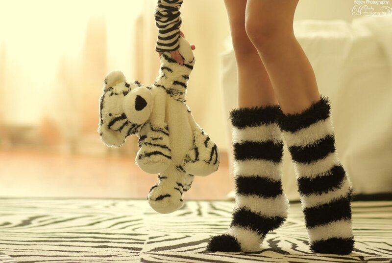Person Holding Stuffed Animal — Black