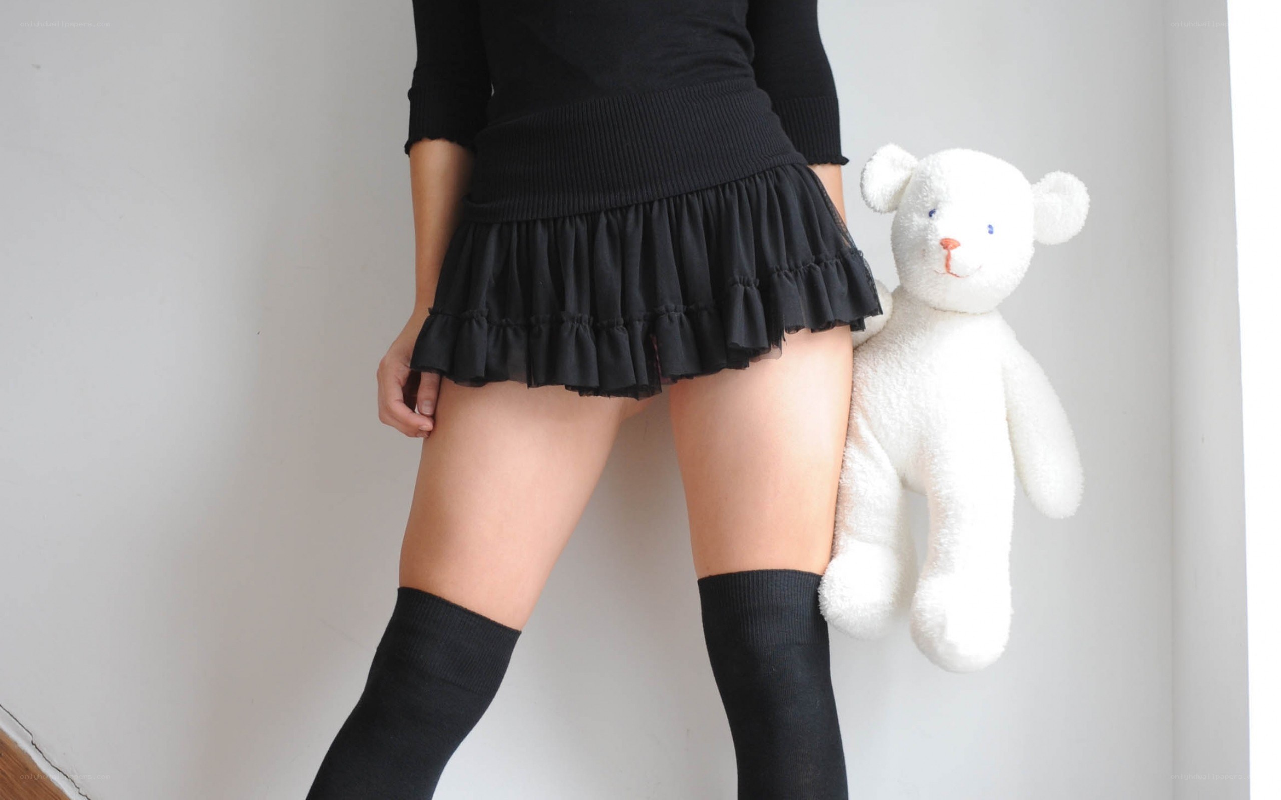 person holding teddy bear