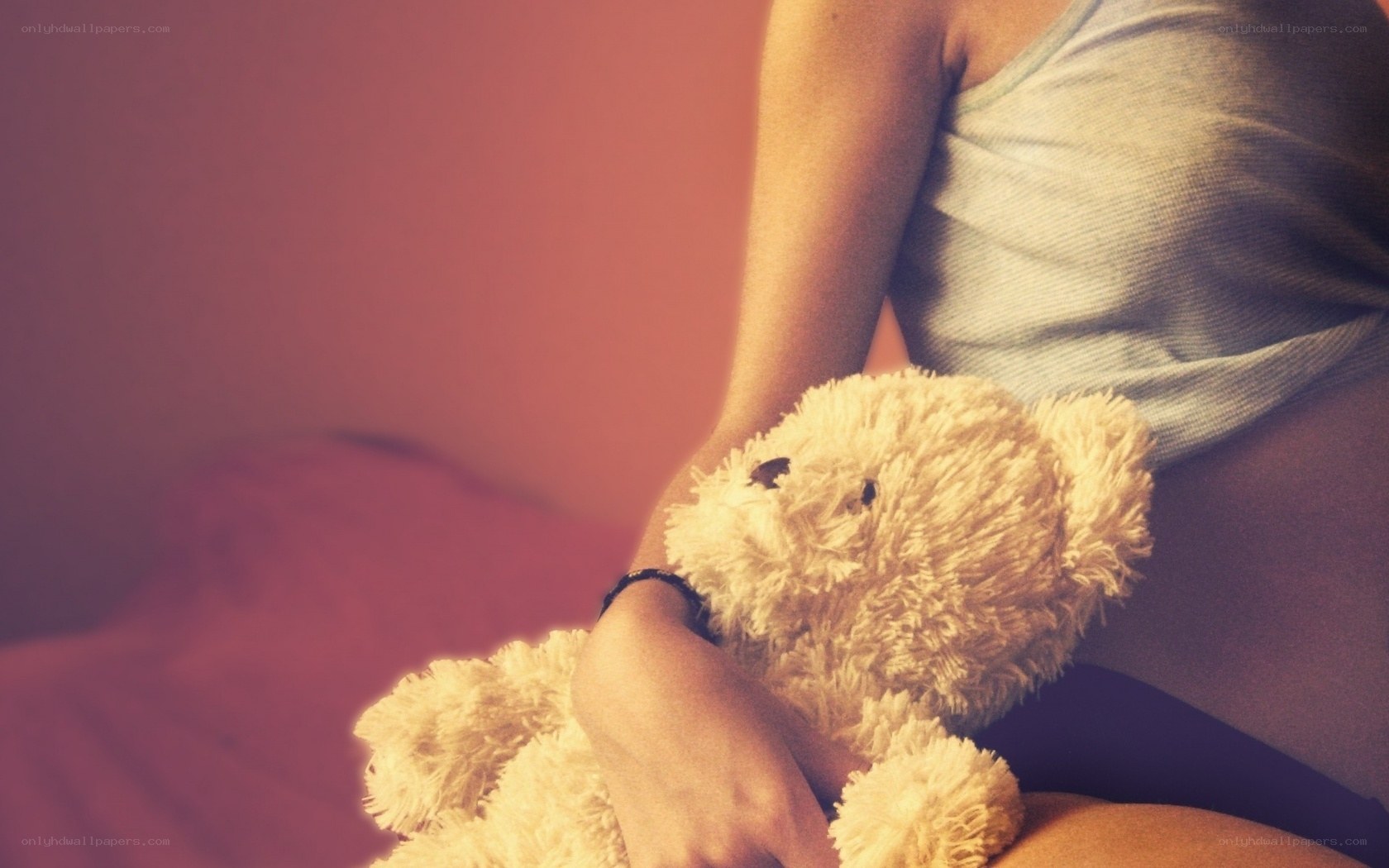 person holding teddy bear