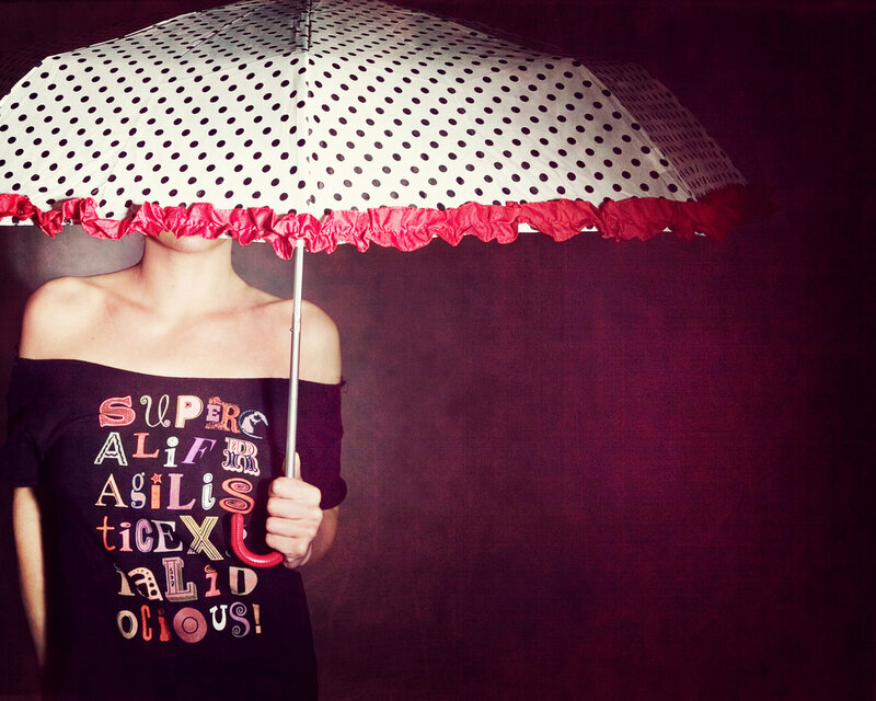 Person Holding Umbrella — Black