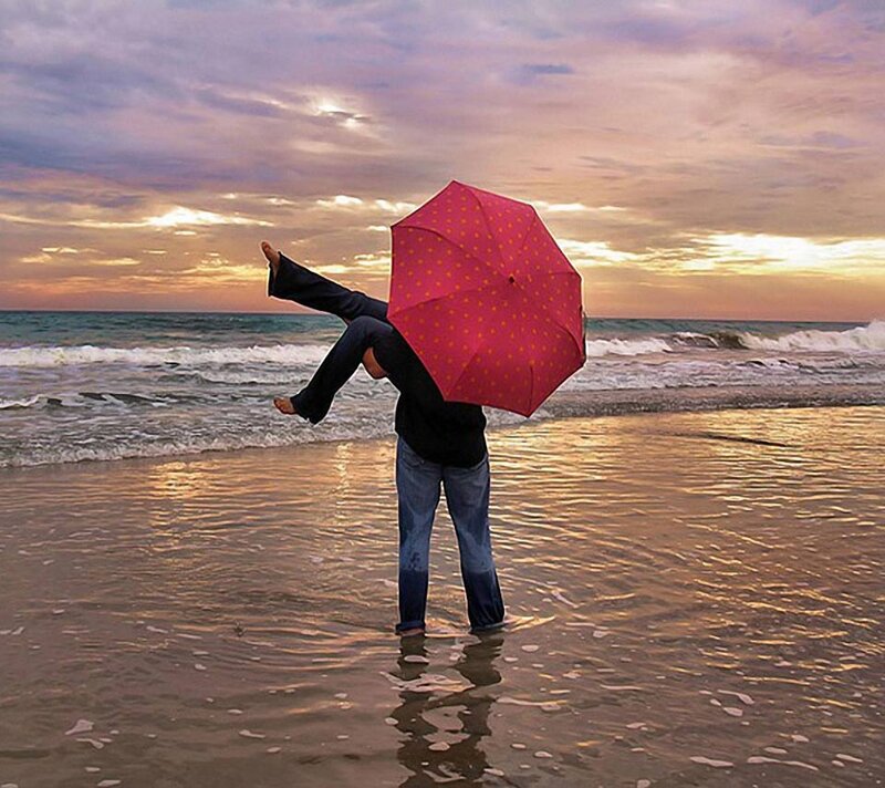 Person Holding Umbrella — Pink
