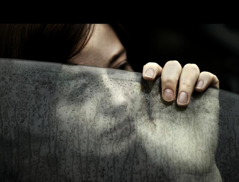 Person Holding Wet Surface