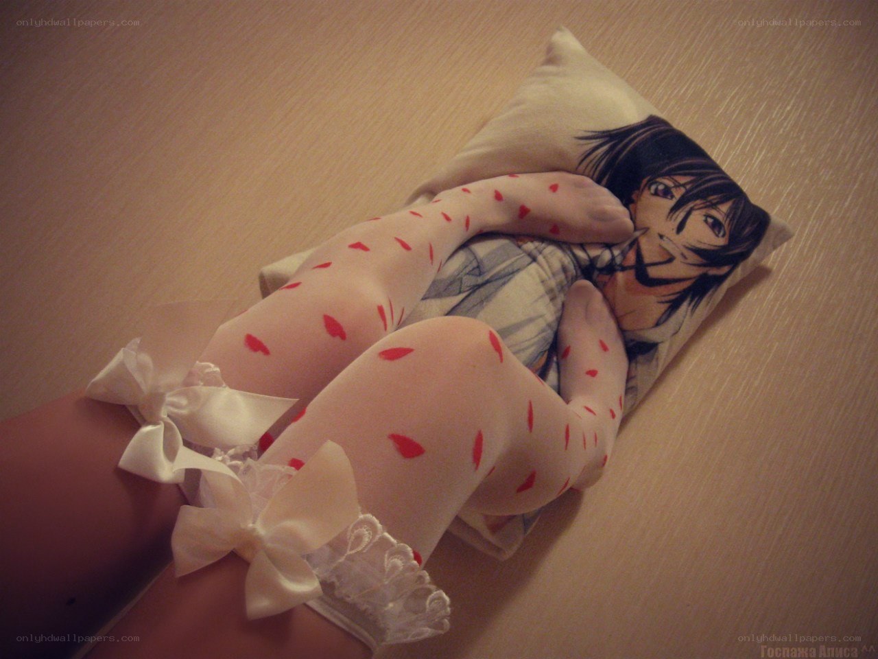 person hugging anime pillow