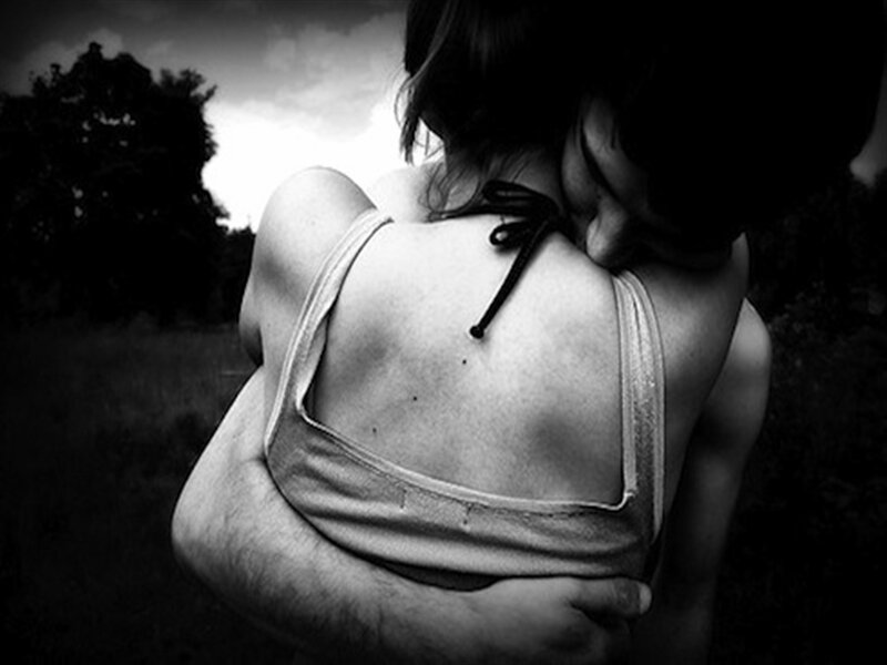Person Hugging Another Person