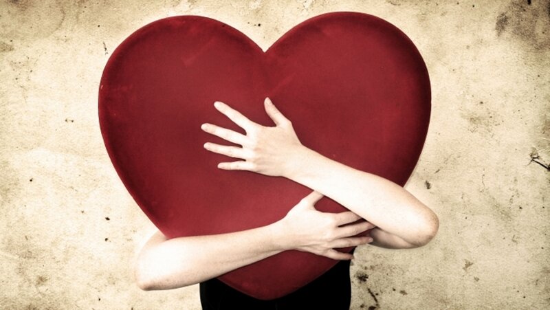 Person Hugging Heart