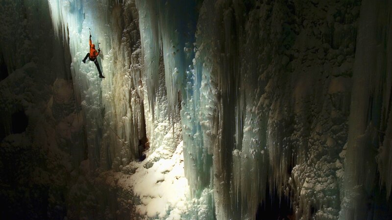 Person Ice Climbing