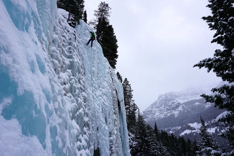 Person Ice Climbing — White