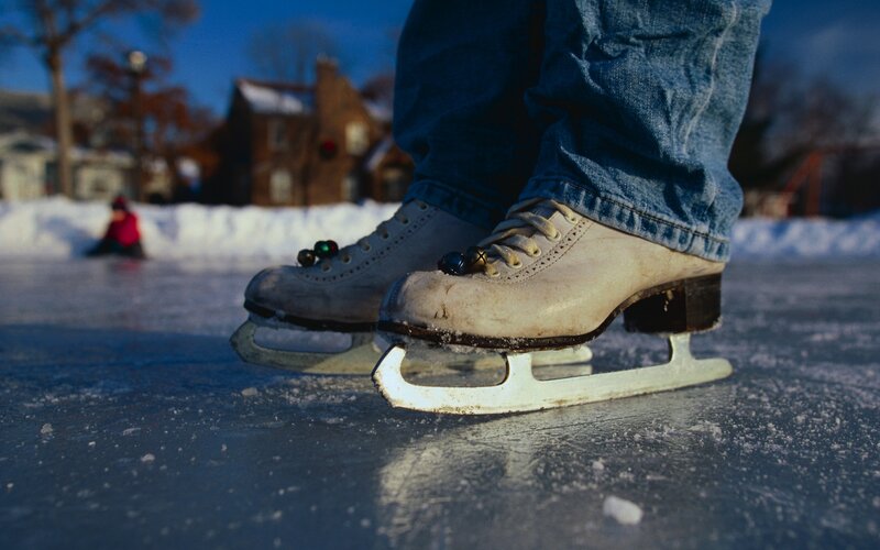 Person Ice Skating — Blue