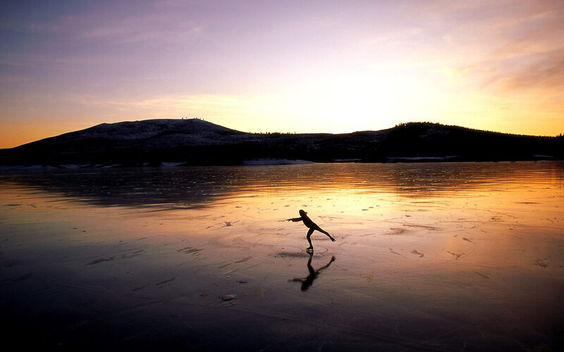 Person Ice Skating — Orange