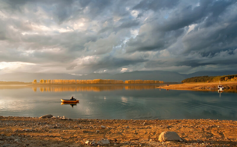 Person in a Boat — Blue, Dramatic, Sunset
