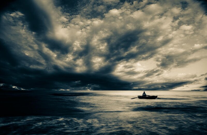 Person in a Boat — Gray, Dramatic