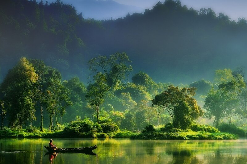 Person in a Boat — Green
