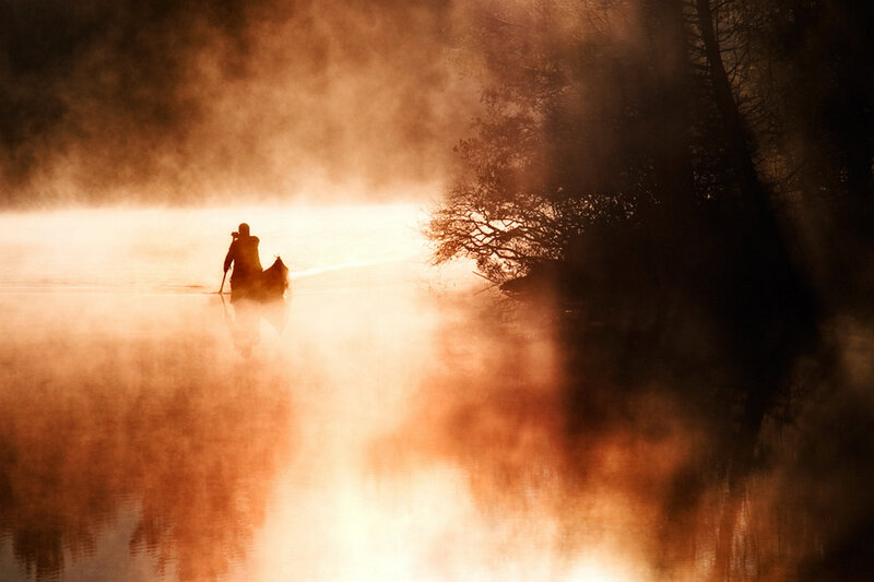 Person in a Boat — Orange, Serene