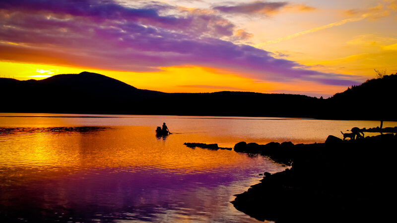 Person in a Boat — Purple, Serene, Sunset