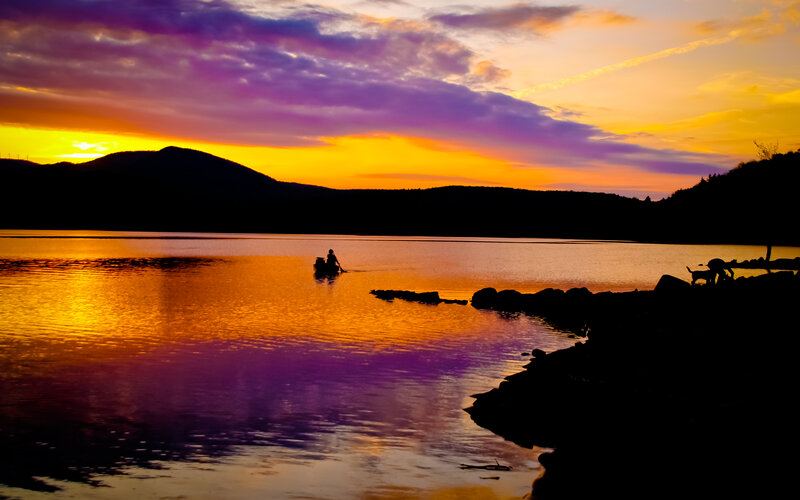 Person in a Boat — Purple