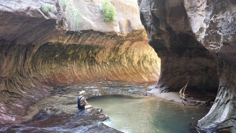 Person in a Canyon Pool
