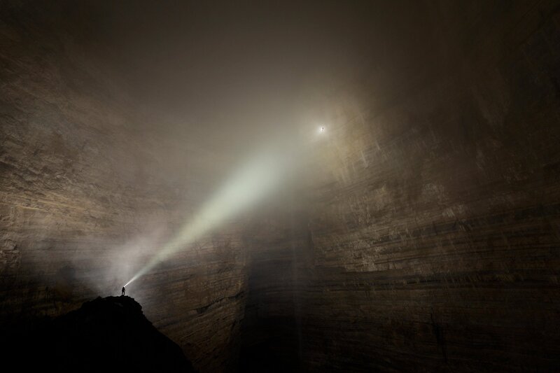 Person in a Cave — Black