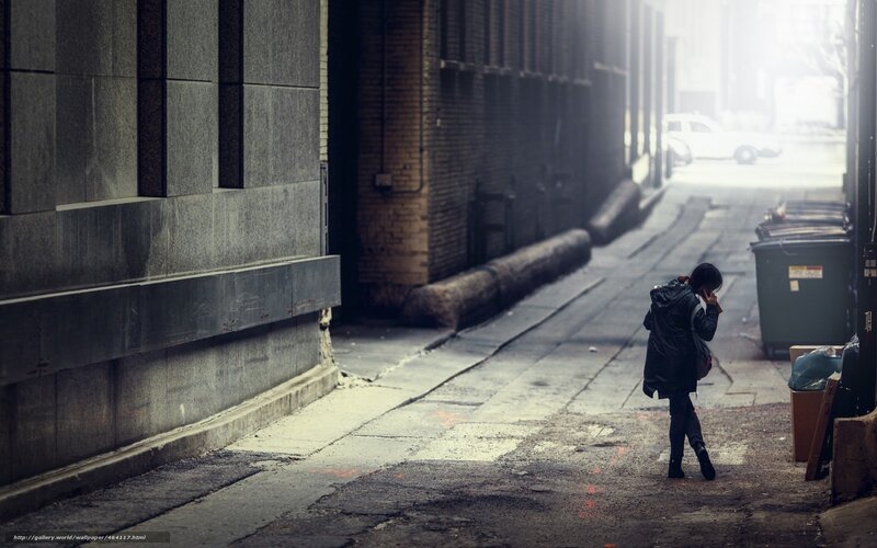 Person in a city alley