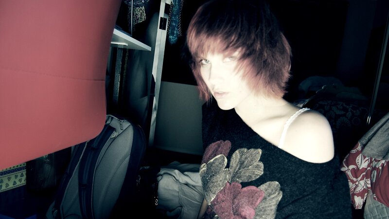 person in a cluttered room