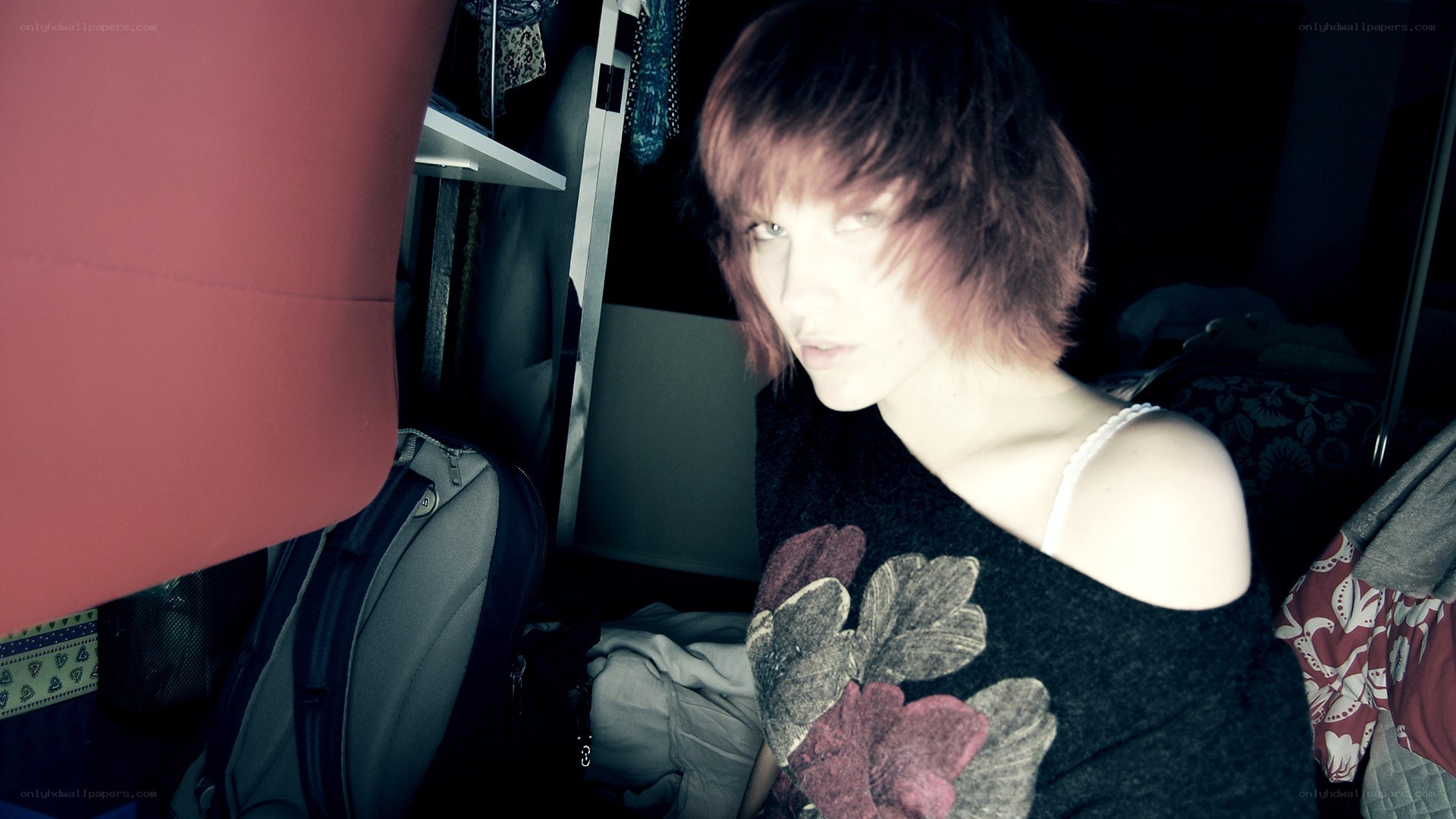 person in a cluttered room