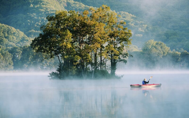 Person in a Kayak — Blue