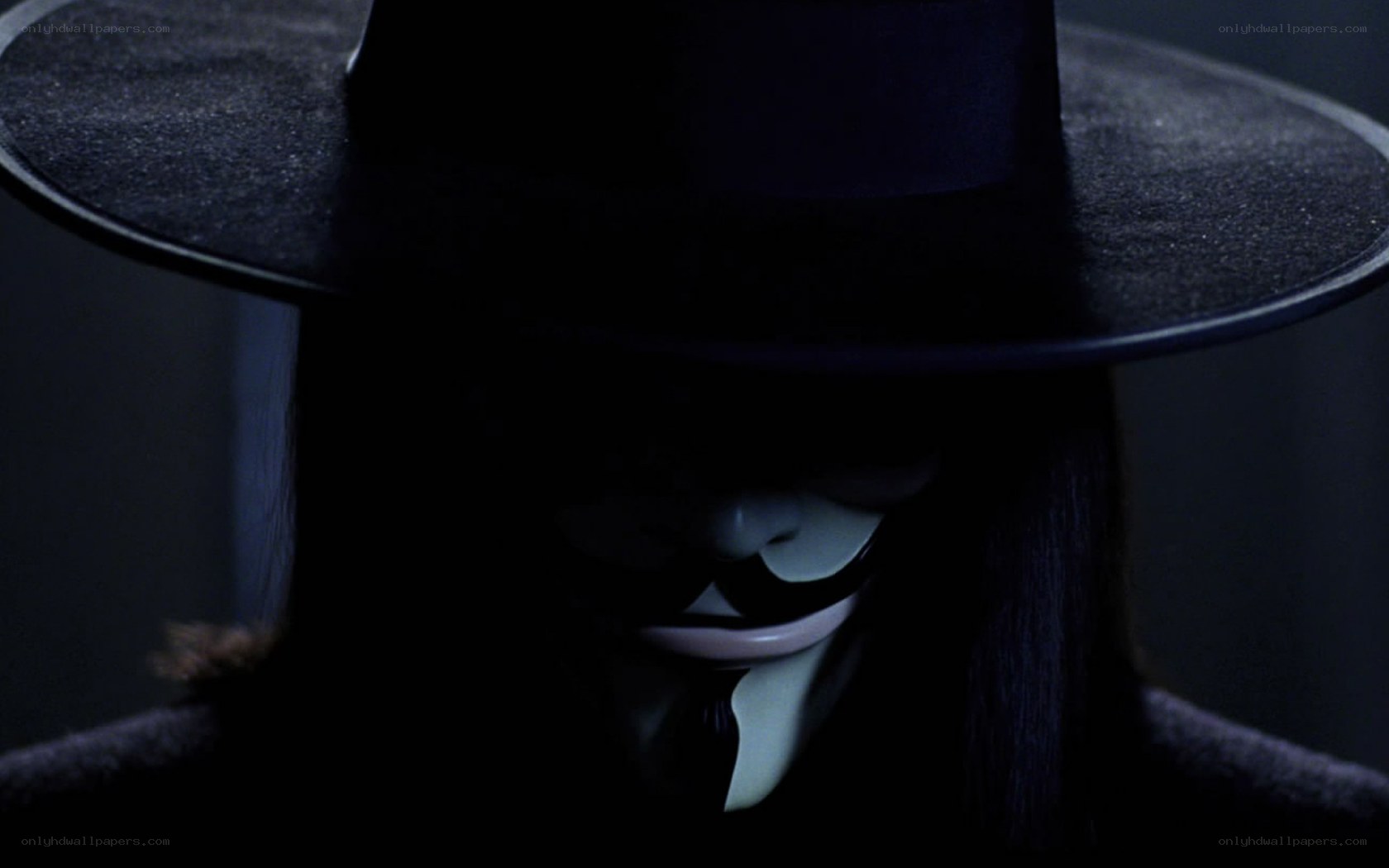 person in a mask and hat