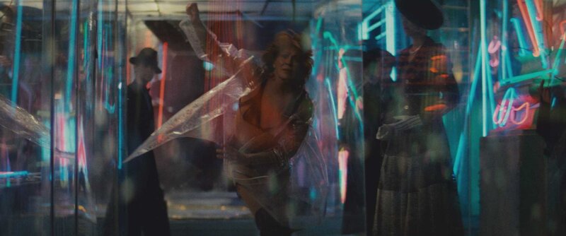 Person in a neon-lit room