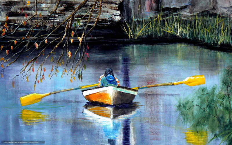 Person in a rowboat on a lake