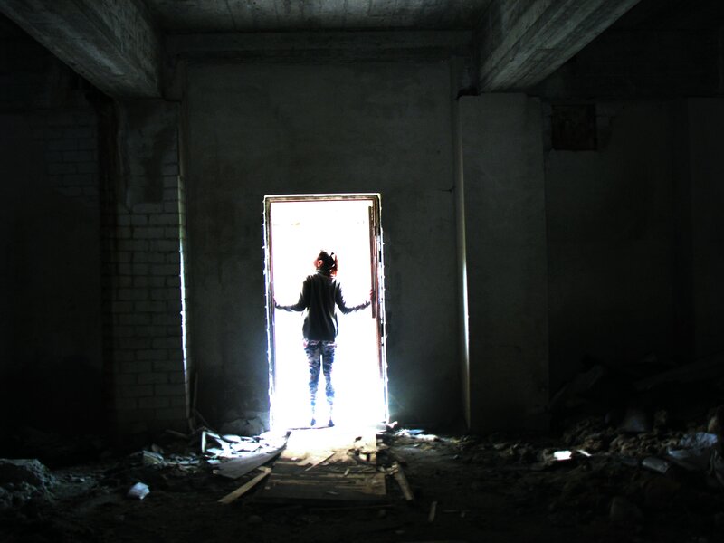 Person in a ruined building