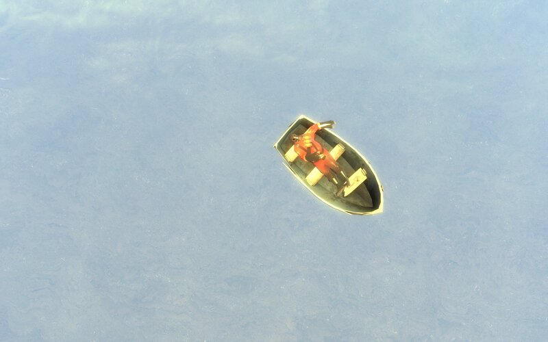 person in a small boat
