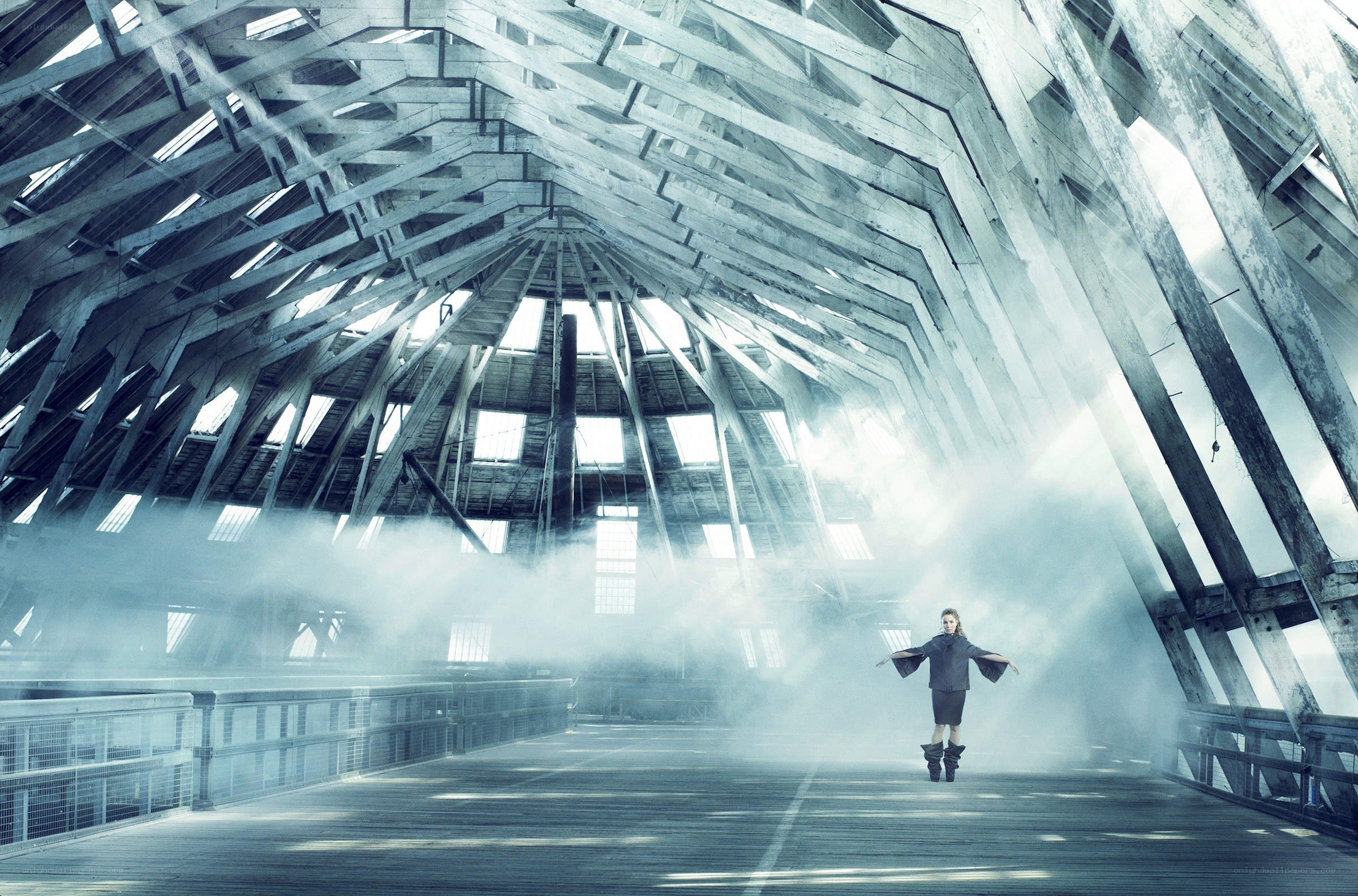 person in a wooden structure