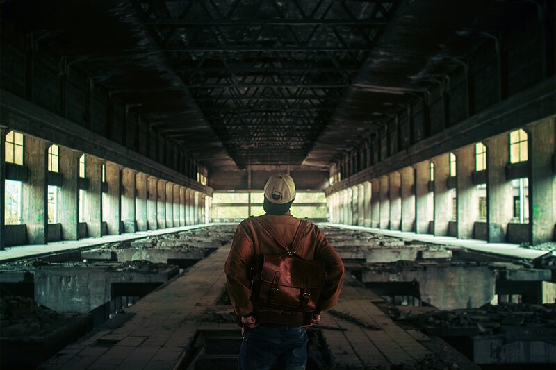 Person in Abandoned Building — Brown, Dramatic