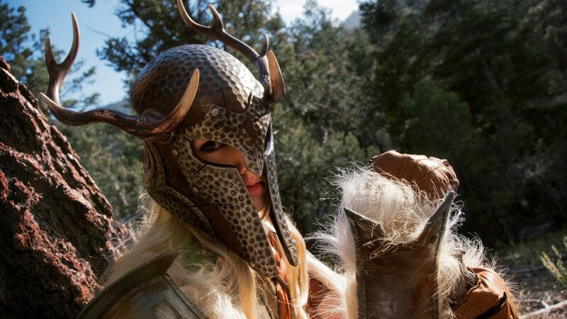 person in antler helmet armor