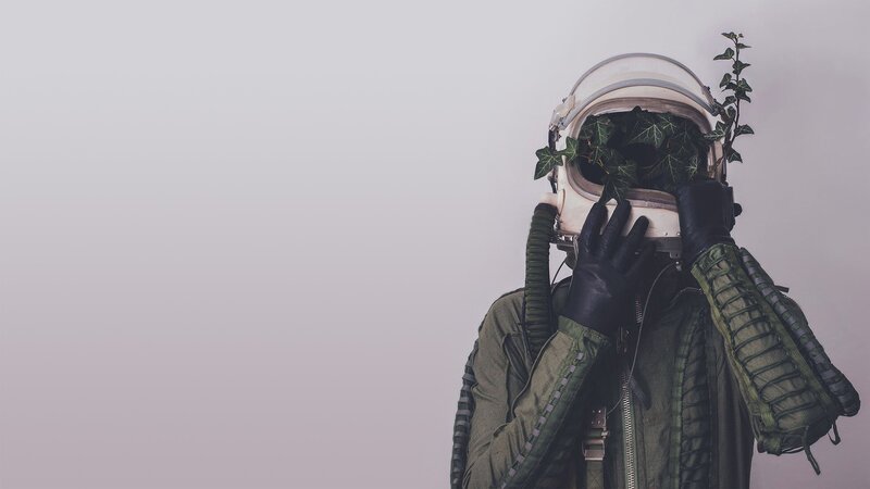 Person in Astronaut Helmet — Green
