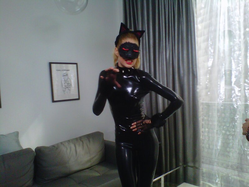 person in black cat costume