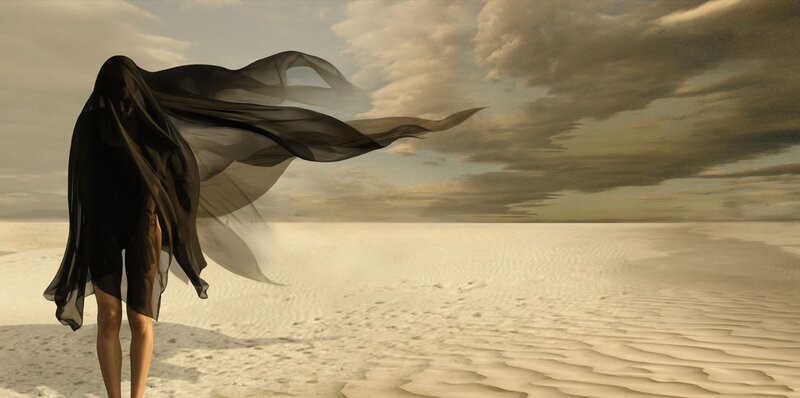 Person in Black Cloak