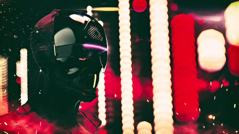 Person in Black Helmet
