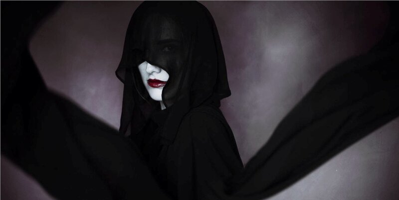 Person in Black Hood — Dramatic, Photograph, White Face Paint