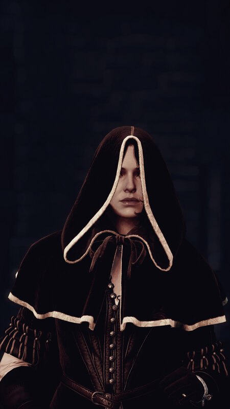 Person in Black Hooded Cloak