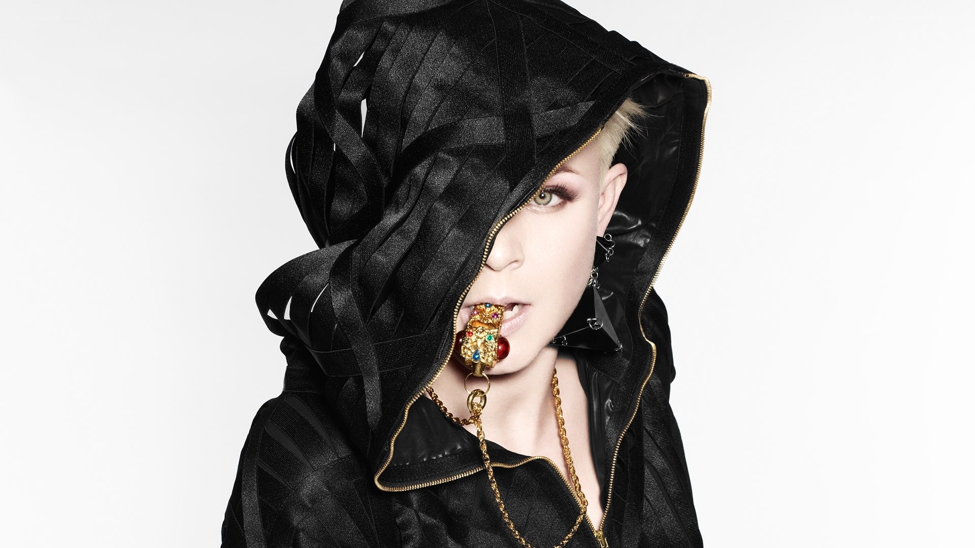 person in black hooded garment