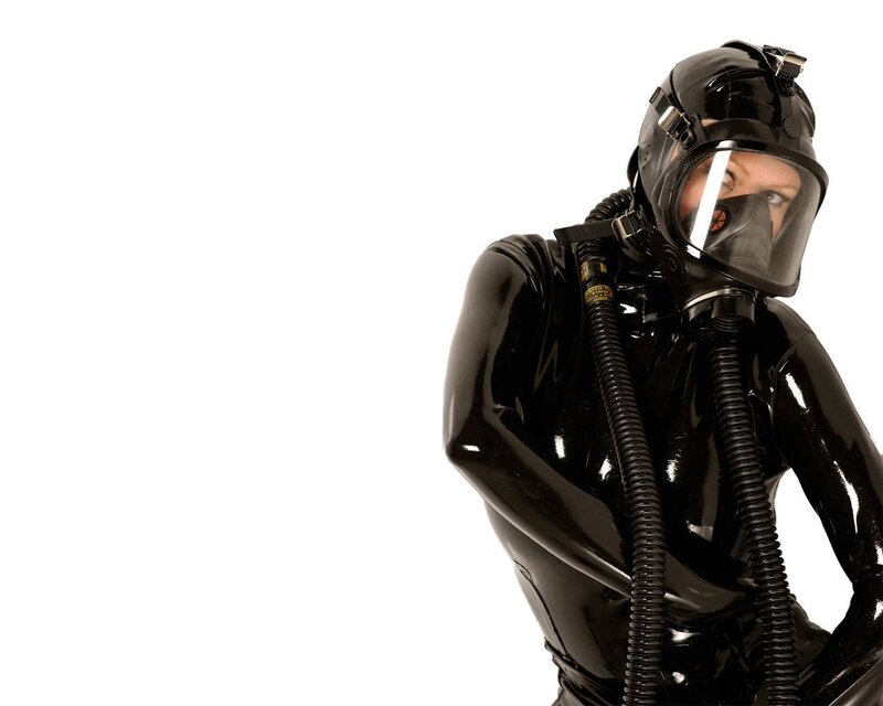 person in black latex suit