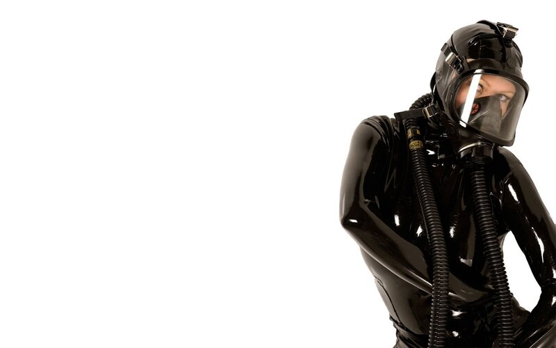 person in black latex suit