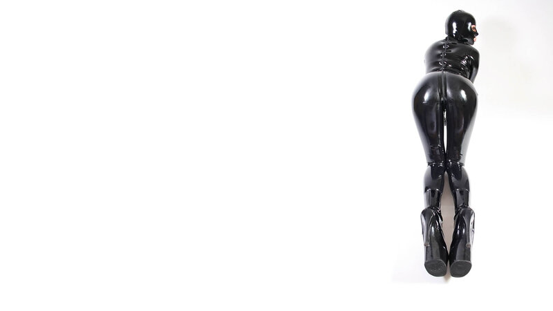 person in black latex suit
