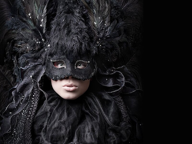 Person in Black Mask — Dramatic