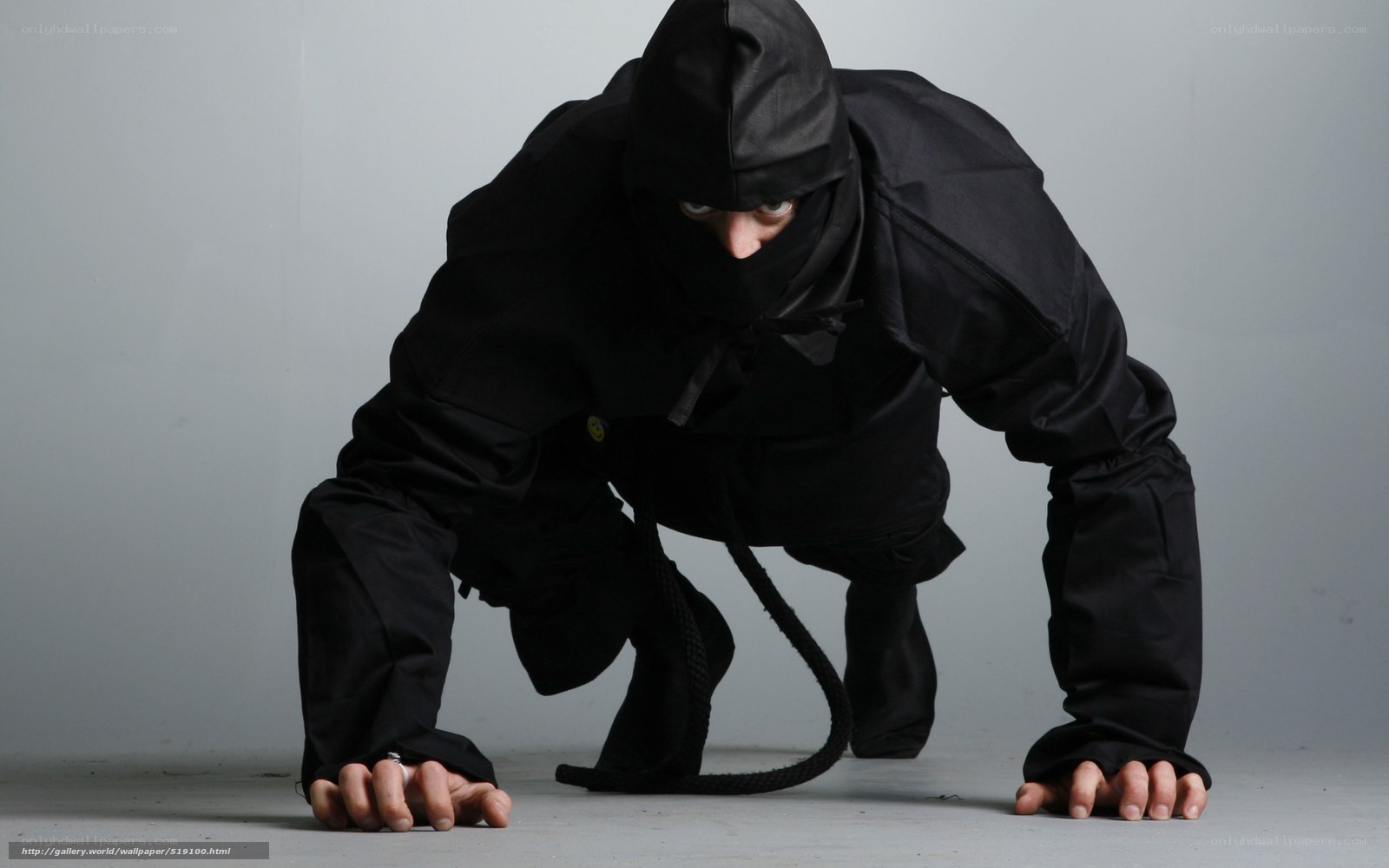 person in black ninja outfit
