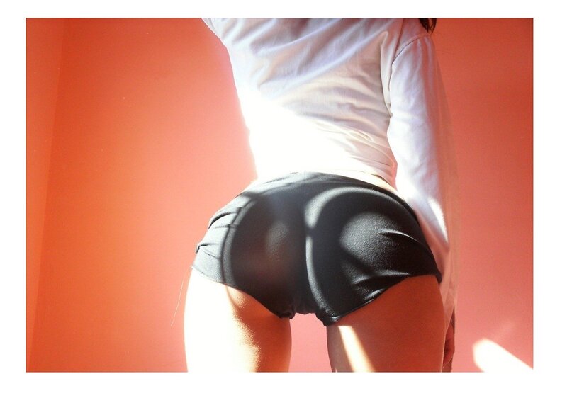 person in black shorts from behind
