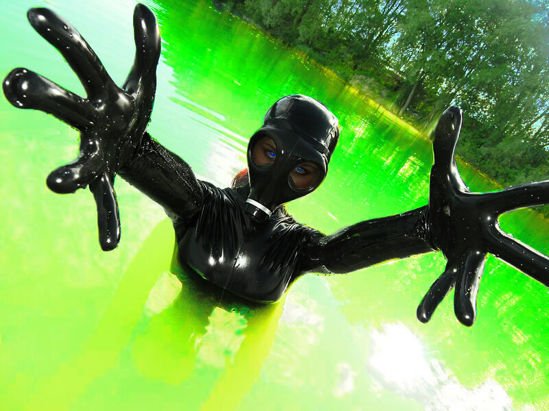 person in black suit underwater