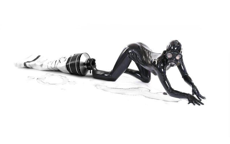 person in black suit with gas mask