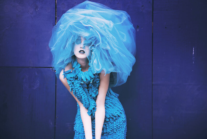 Person in Blue Costume — Dramatic