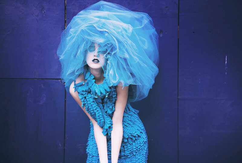 Person in Blue Costume